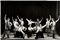 Танцевальный коллектив художественной самодеятельности исполняет украинский народный танец на сцене клуба им. Ленина